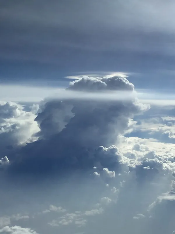 Towering cumulus with a halo over Africa, inbound to Kigali, Rwanda.