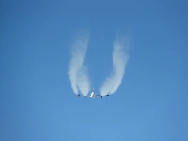 Lufthansa Boeing 747 goes overhead.