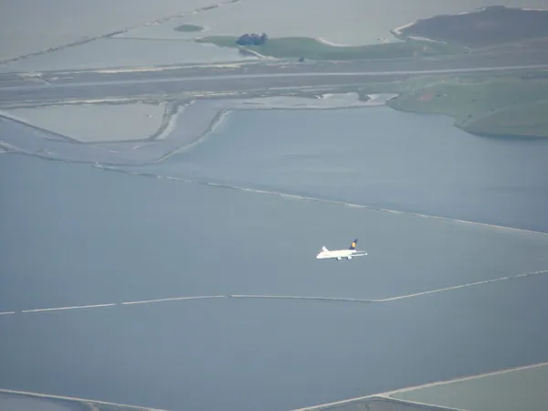 Lufthansa Airbus A380 on final for one of the parallel runways at San Francisco International Airport.