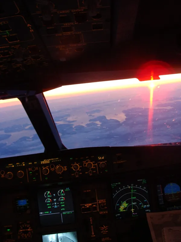 Sunrise over Greenland on the Calgary–Amsterdam flight.