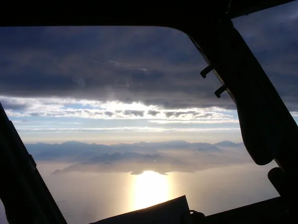 Sardinia at sunrise, early August, on the descent into Olbia.