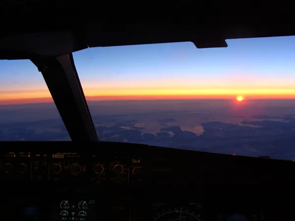 Sunrise over Greenland on the Calgary–Amsterdam flight.